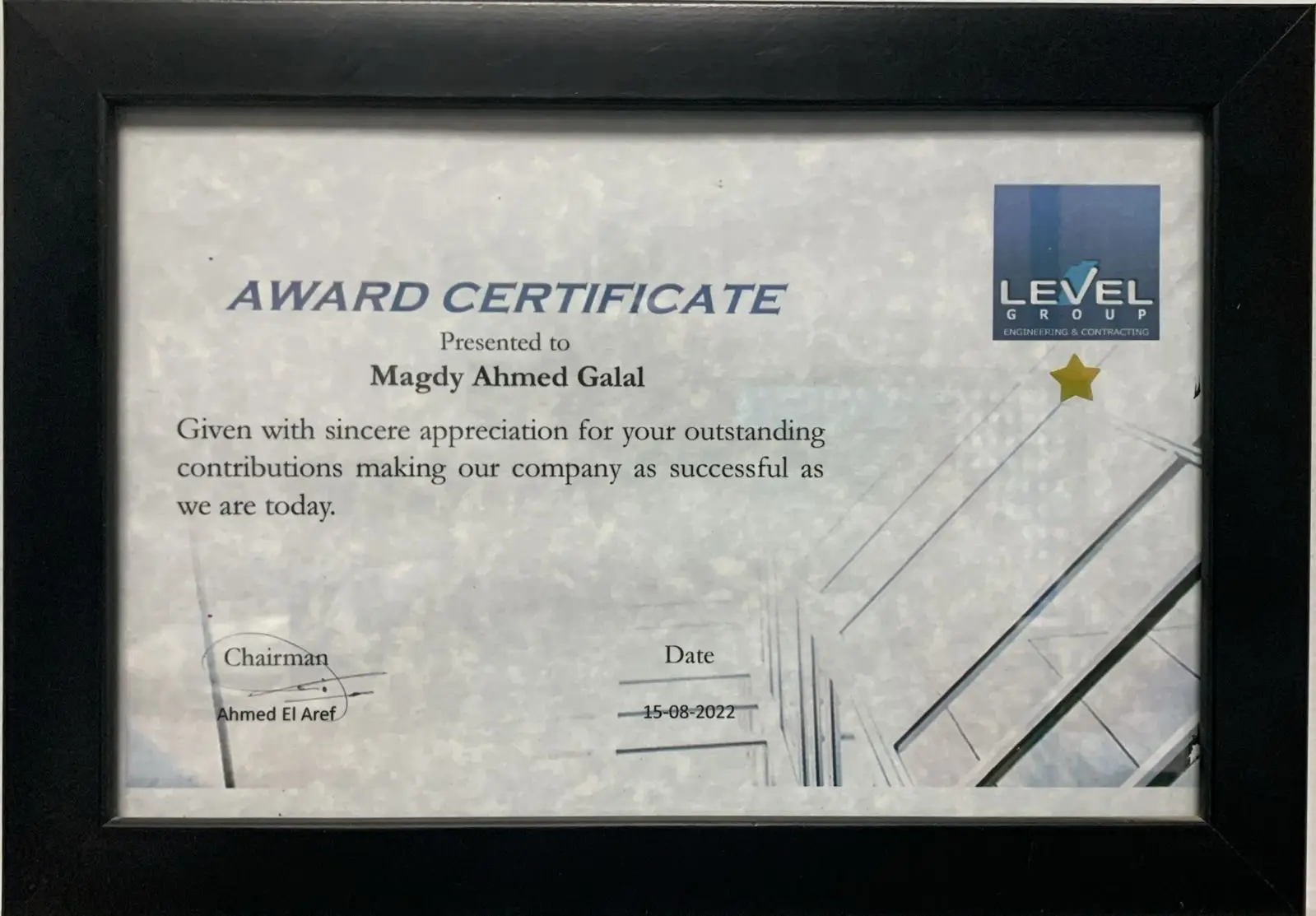Award certificate presented to Magdy Ahmed Galal